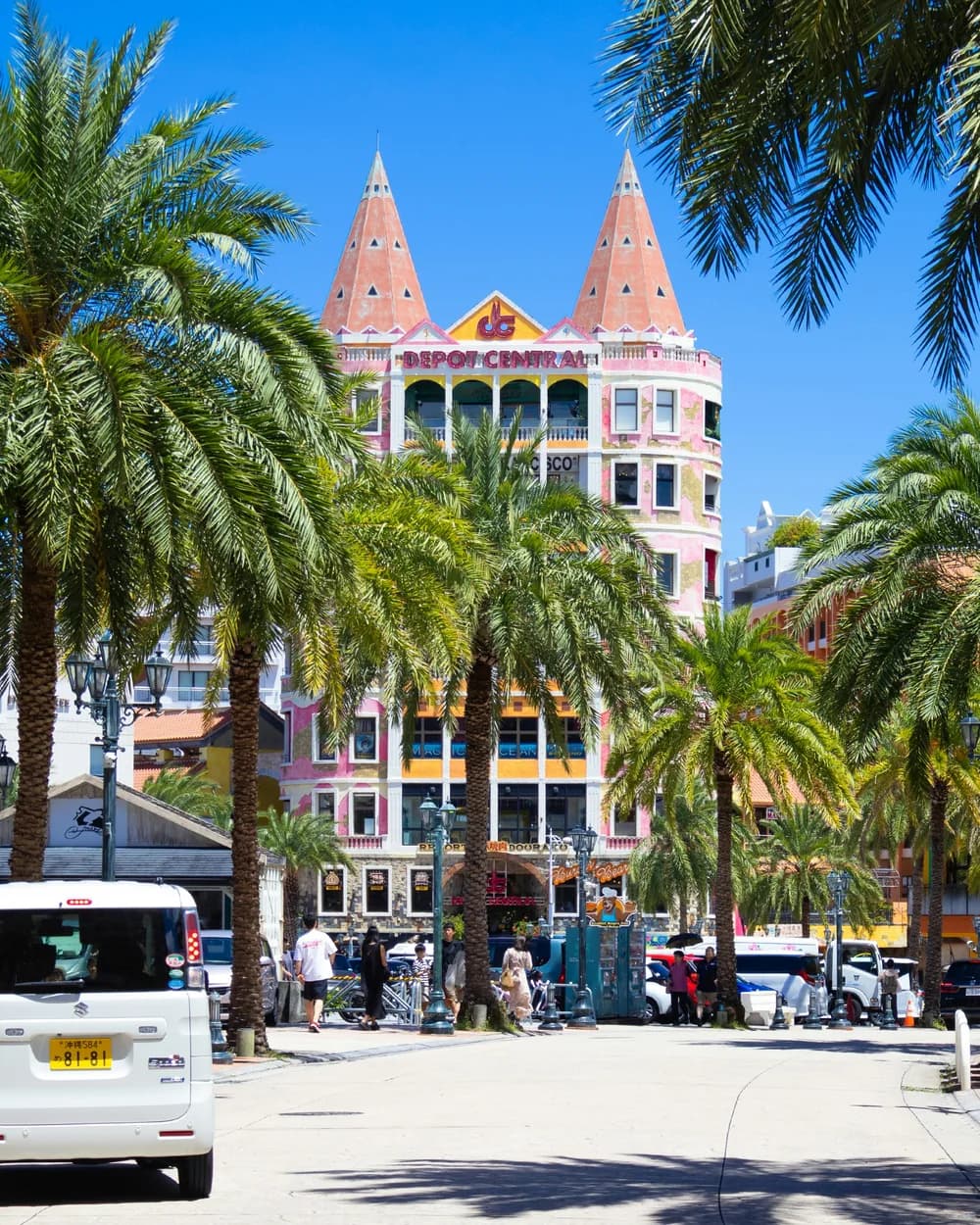 Palm trees and colorful buildings in American Village